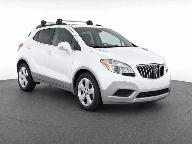 Used 2015 (Additional charge - premium paint. Includes (BQX) Satin Nickel Metallic lower accent color.) Buick 4DR FWD image 1