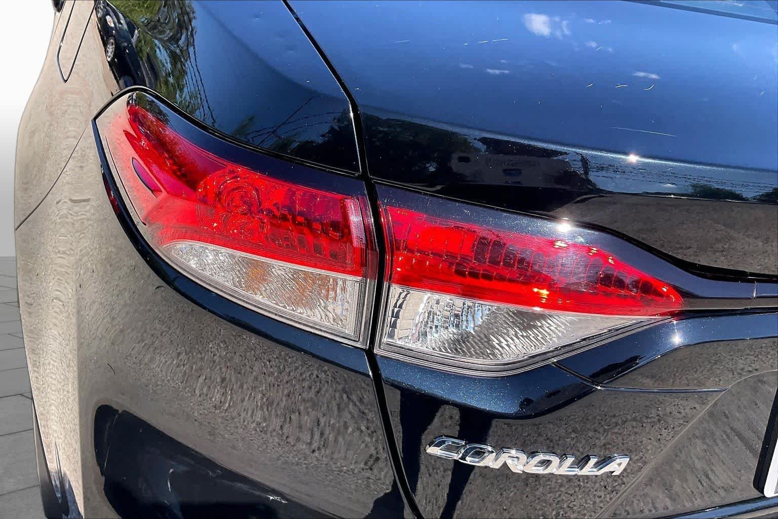 Used 2025 Midnight Black Metallic Toyota LE image 25