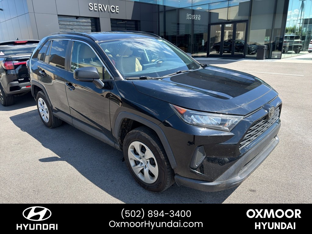 Used 2020 Midnight Black Metallic Toyota LE image 1