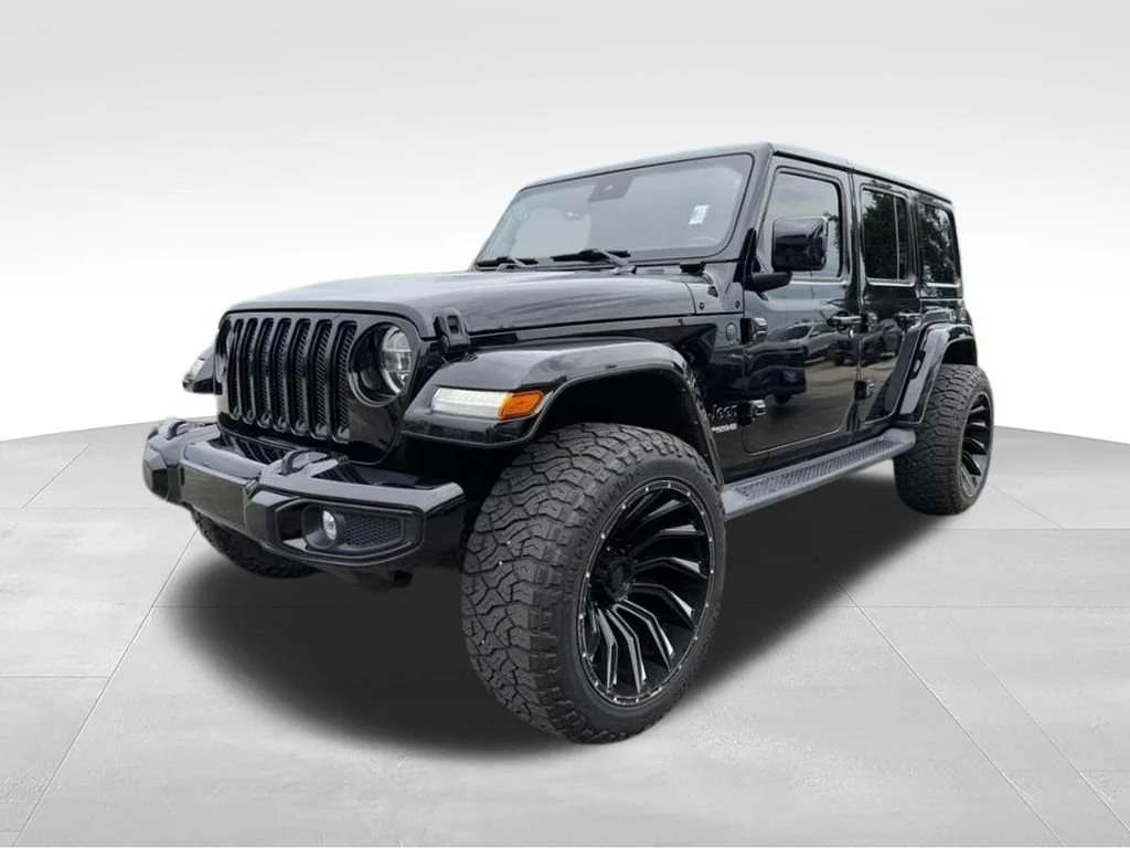 Used 2021 Black Jeep Unlimited Sahara image 1