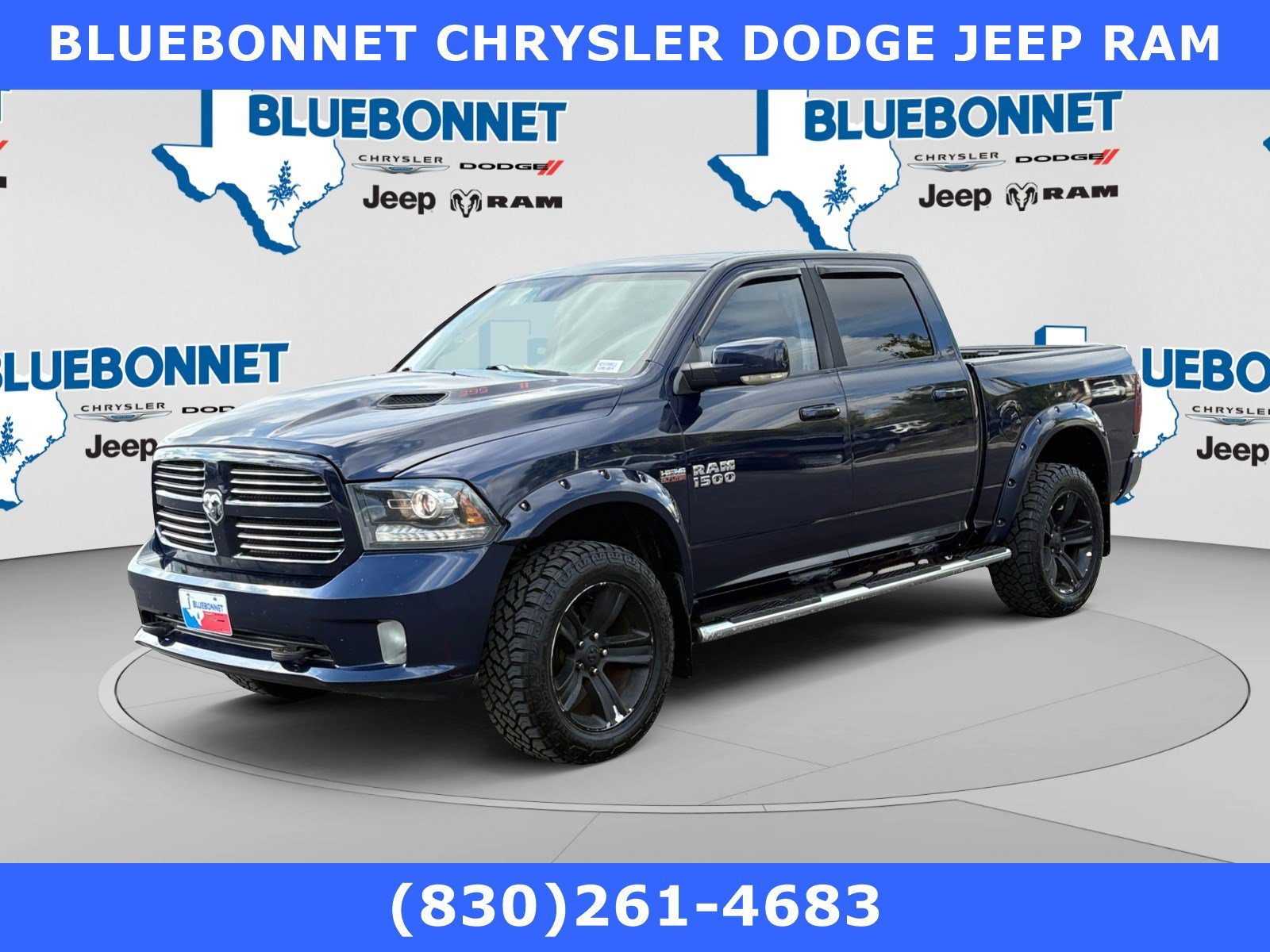 Used 2013 True Blue Pearl Ram Sport image 1