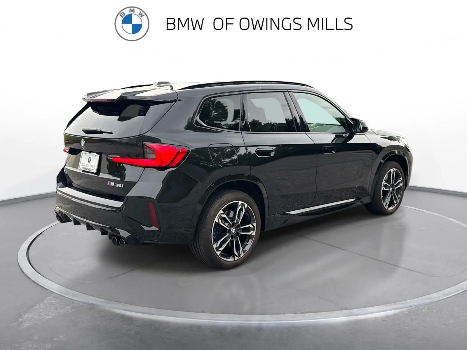 Used 2025 Black Sapphire Metallic BMW M35i image 9