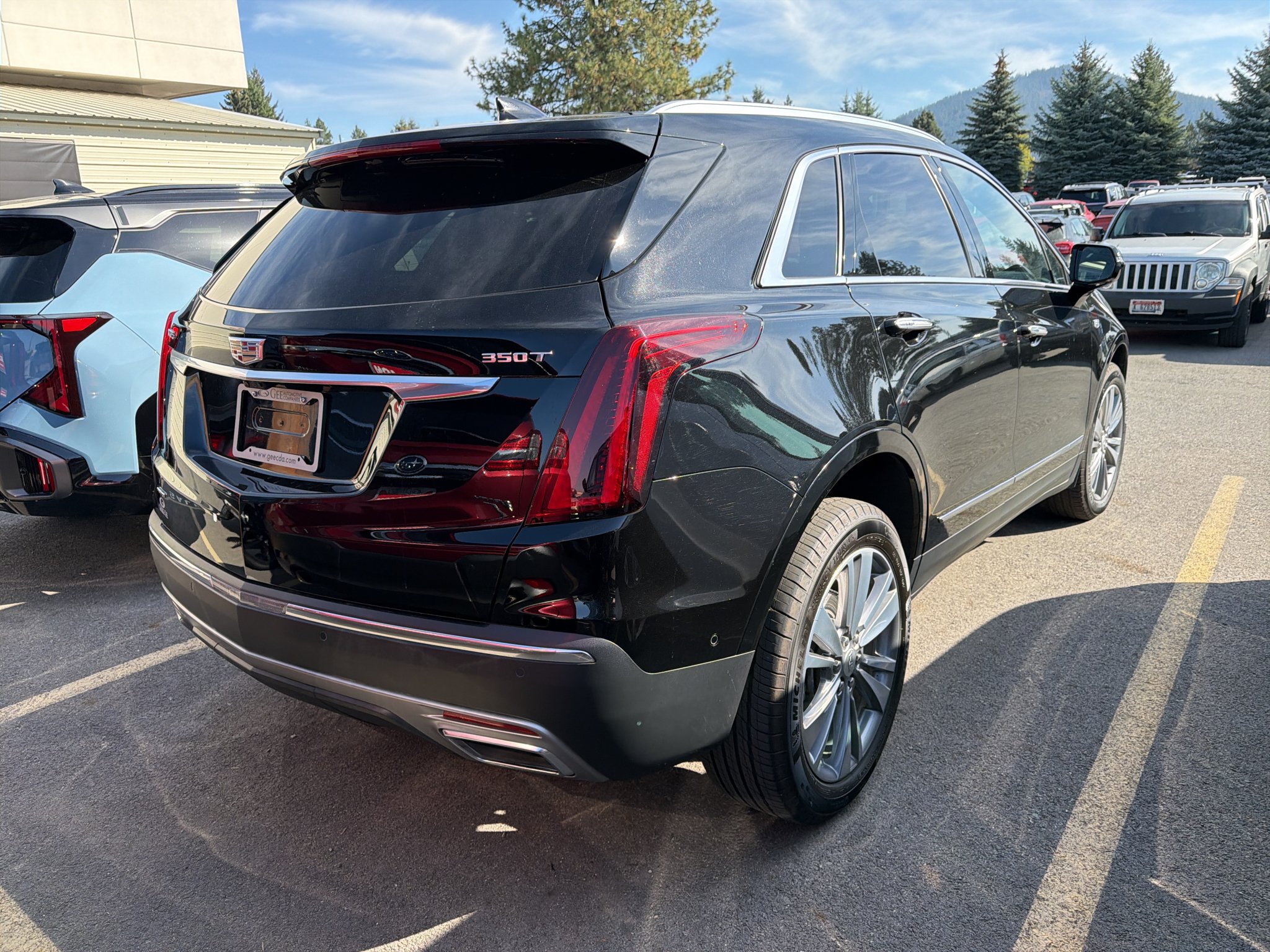 Used 2025 Stellar Black Metallic Cadillac Premium Luxury image 4