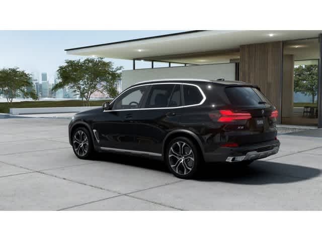 Used 2026 Black Sapphire Metallic BMW sDrive40i image 2
