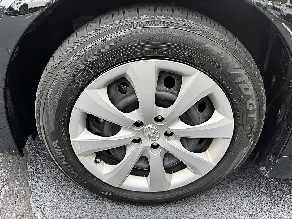Used 2024 Midnight Black Metallic Toyota Hybrid LE image 21