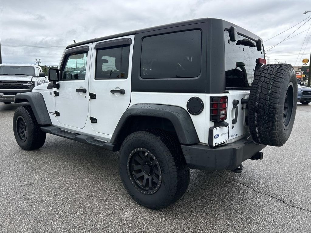 Used 2012 Bright White Jeep Unlimited Sport image 6