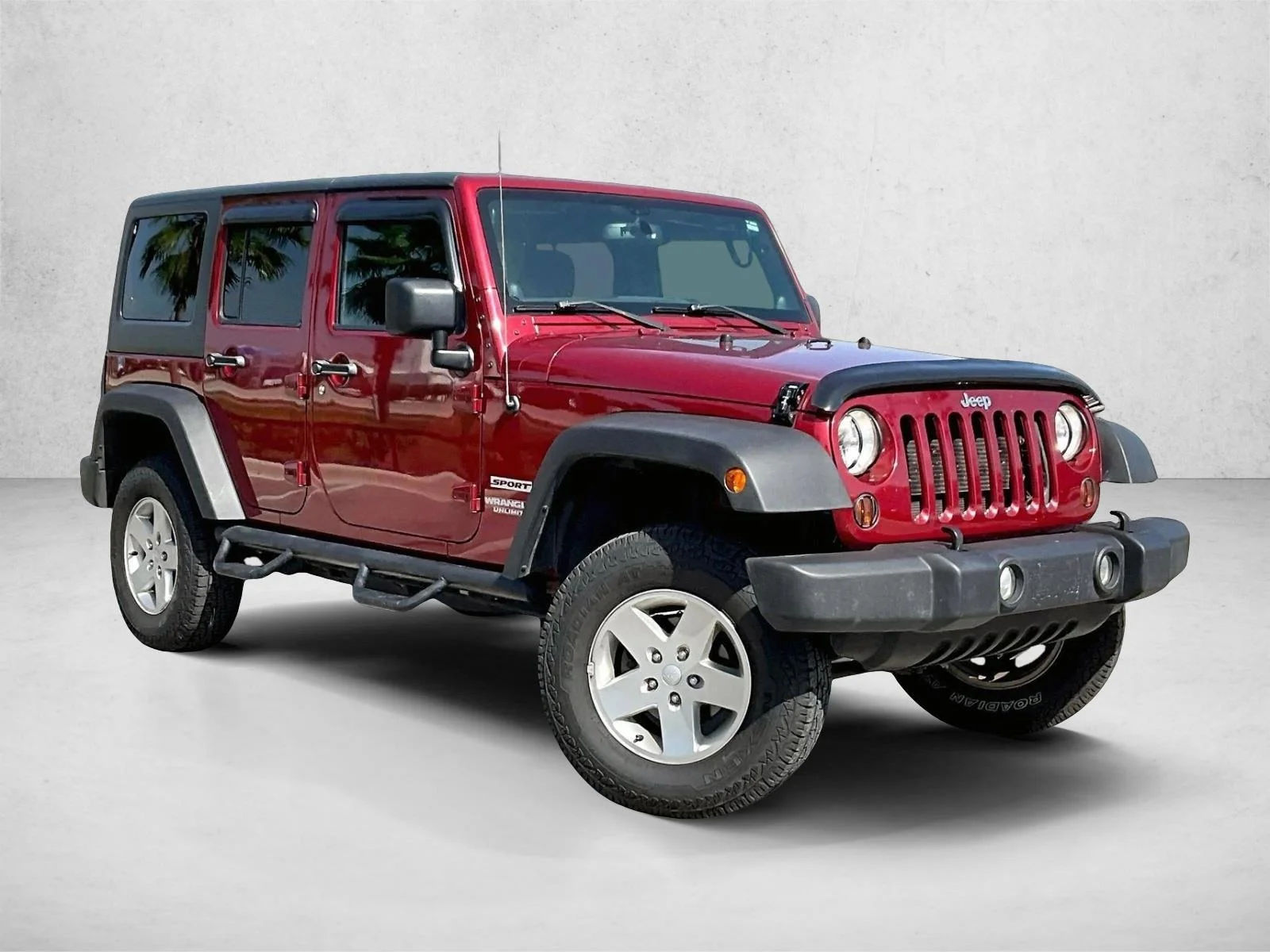 Used 2013 Deep Cherry Red Crystal Pearl Jeep Sport image 12