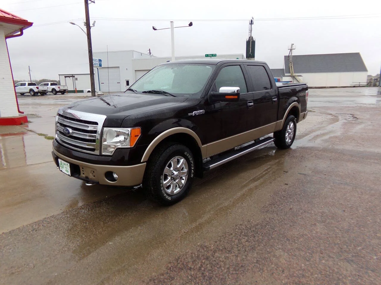 Used 2013 Tuxedo Black Metallic/Pale Adobe Metallic Ford Lariat 4x4 4dr SuperCrew Styleside 5.5 ft. SB image 1