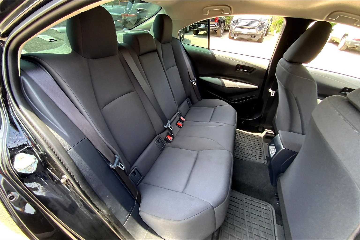 Used 2023 Midnight Black Metallic Toyota LE image 19