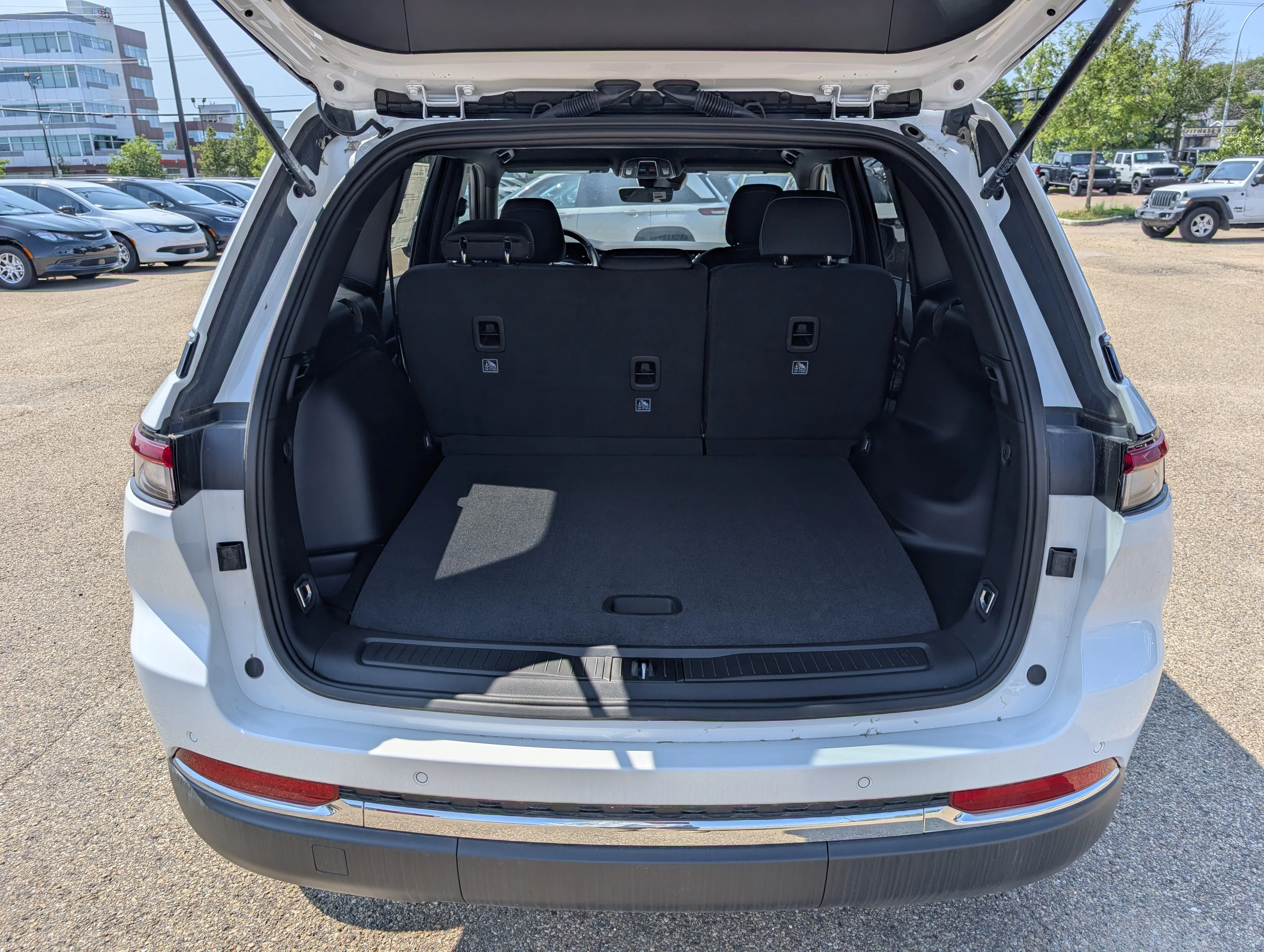 New 2025 Bright White Jeep Laredo image 6