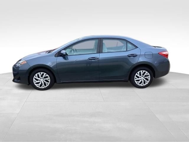 Used 2018 Slate Metallic Toyota LE image 1