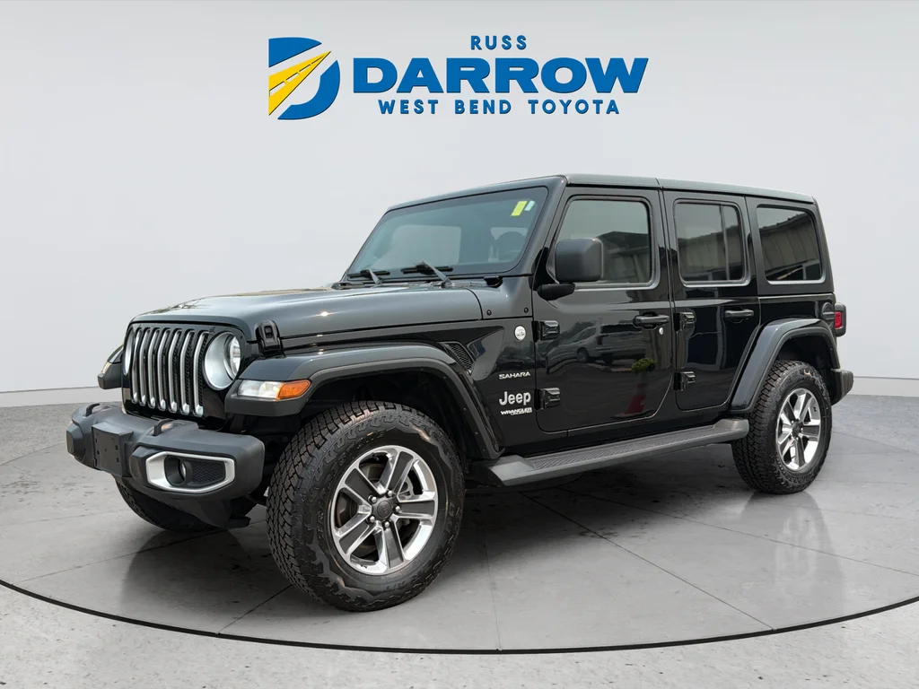 Used 2021 Black Jeep Unlimited Sahara image 1