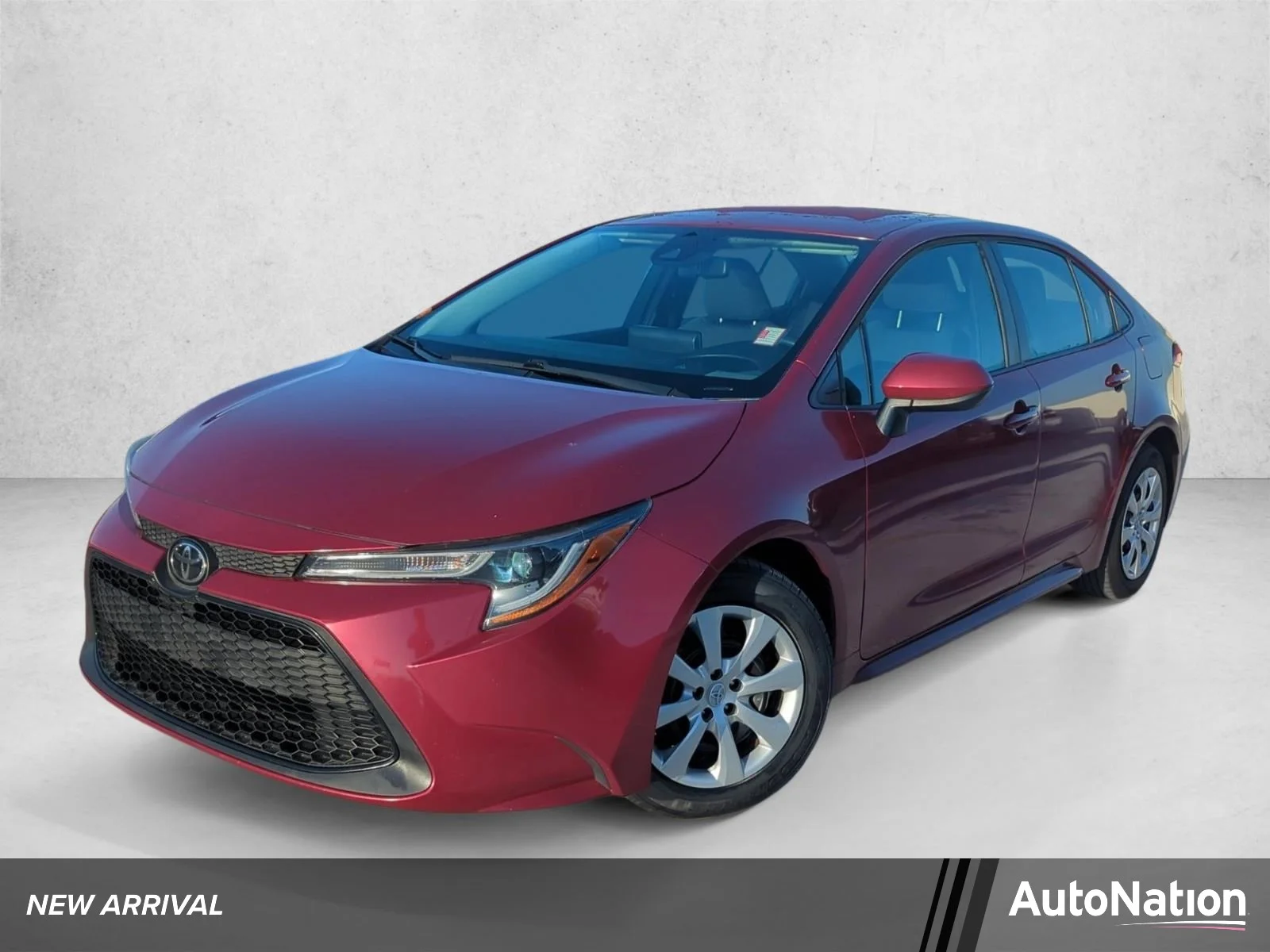 Used 2022 Ruby Flare Pearl Toyota LE image 1