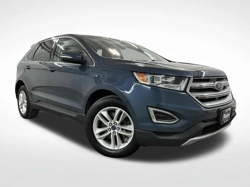 Used 2016 Blue Metallic Ford SEL image 4