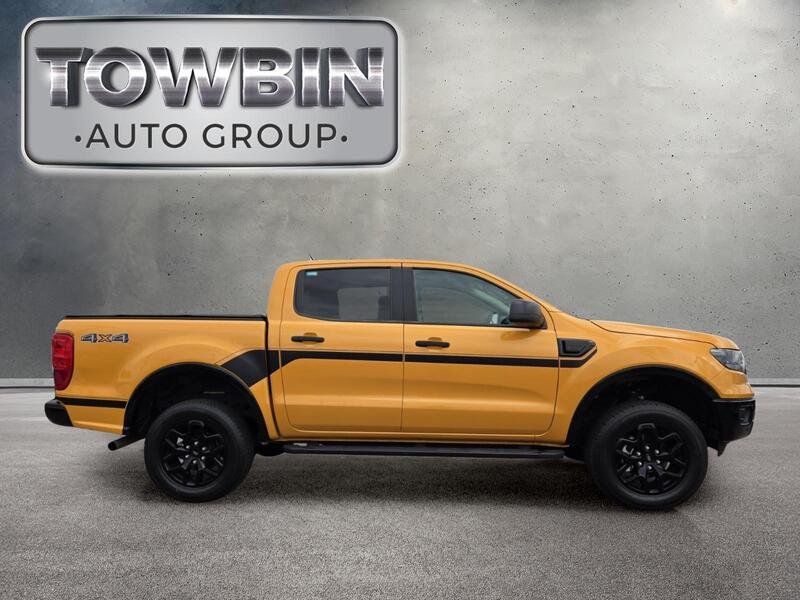 Used 2022 Orange Metallic FORD XLT 4WD SUPERCREW 5