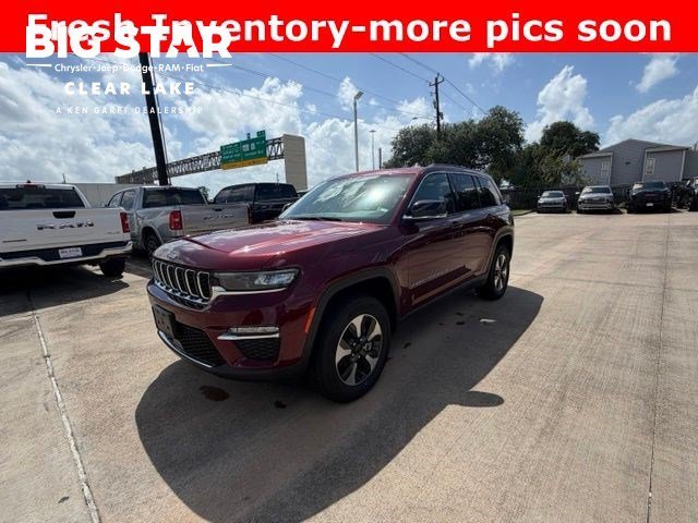 Used 2024 Velvet Red Pearlcoat Jeep 4xe image 1