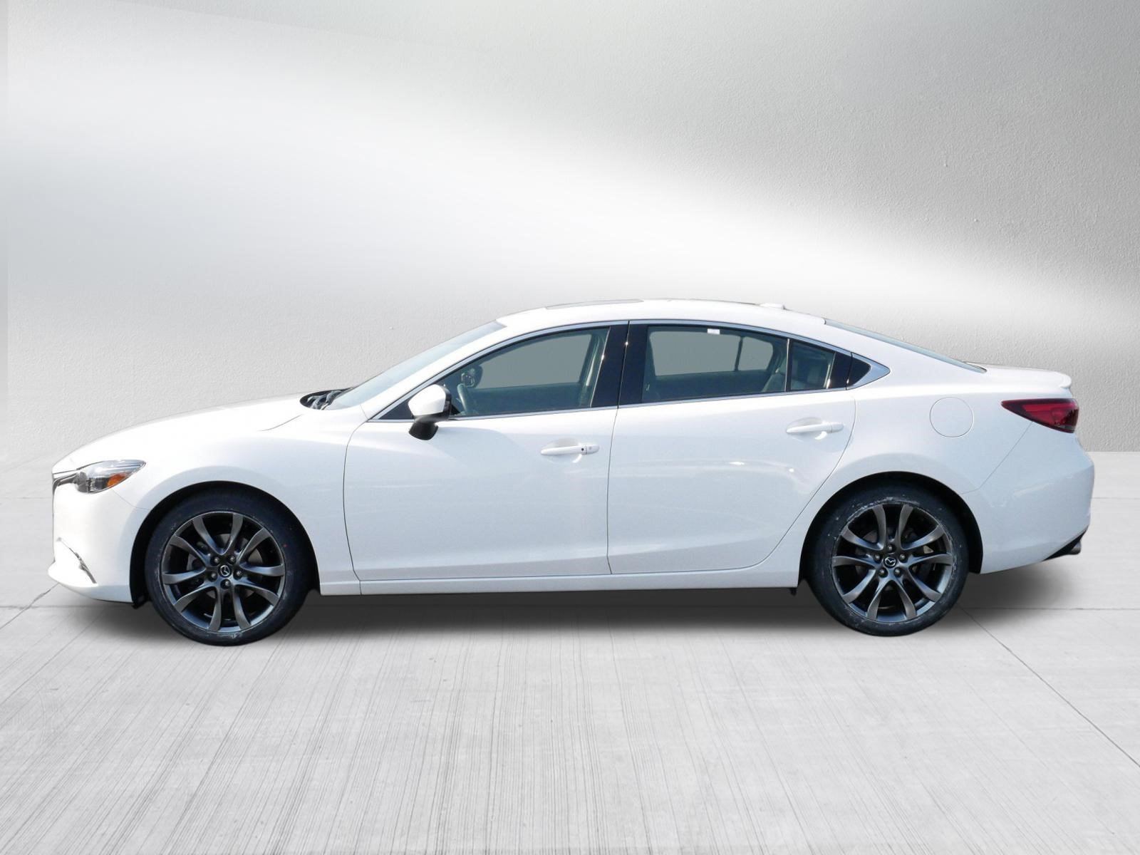 Used 2016 Snowflake White Pearl Mica Mazda i Grand Touring image 4