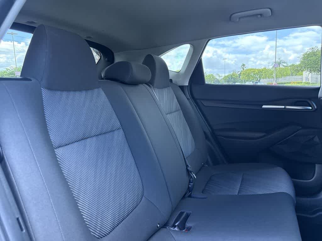 Used 2024 Snow White Pearl Kia LX image 26