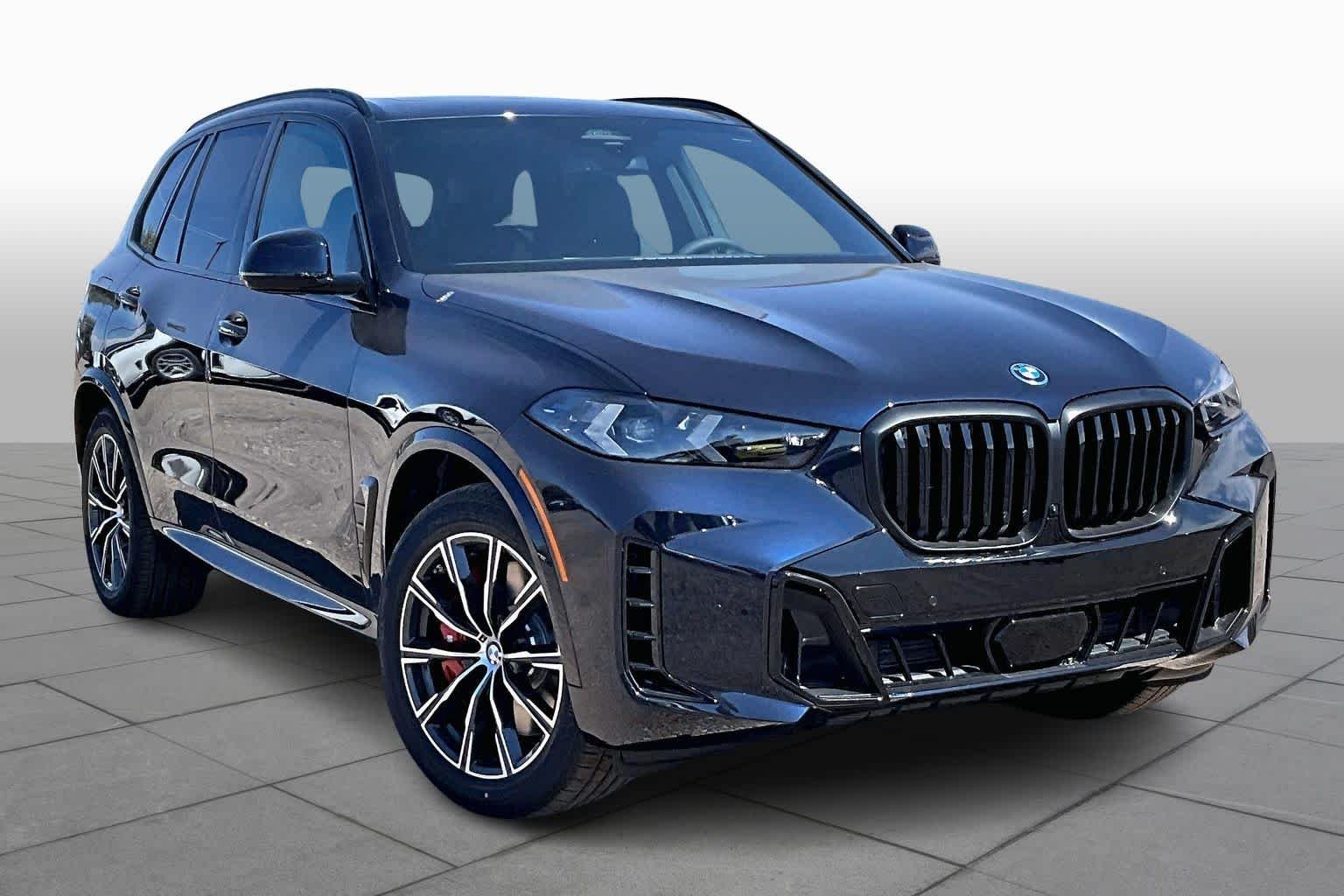 New 2026 Carbon Black Metallic BMW xDrive50e image 2