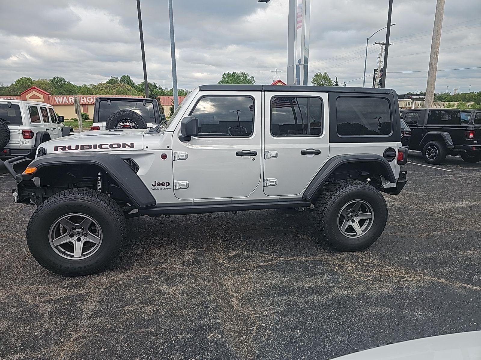 Used 2023 Jeep Wrangler 4-Door Rubicon with VIN 1C4HJXFG0PW595999 for sale in Kansas City
