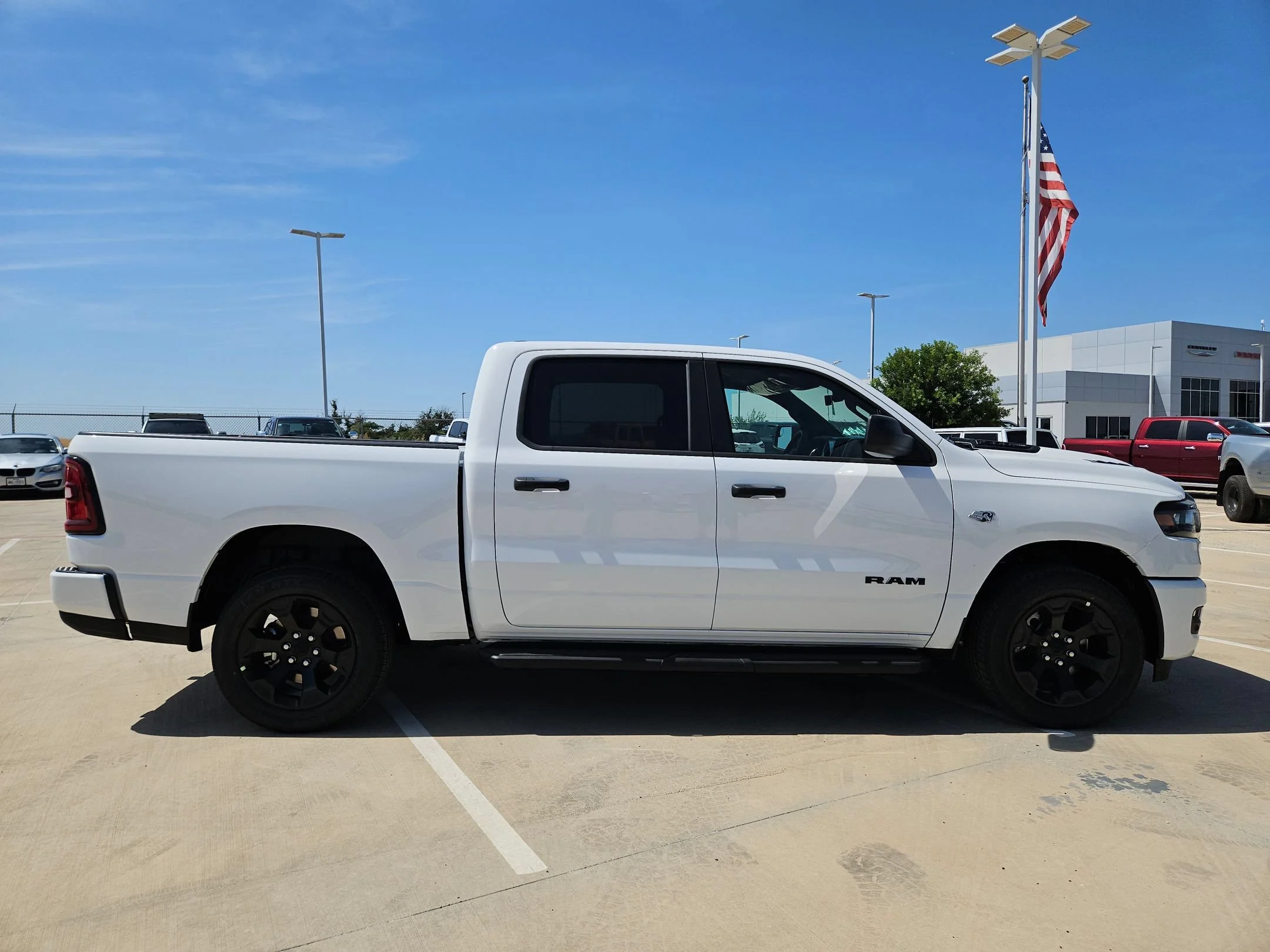 New 2026 Bright White Clearcoat RAM Black Express image 2