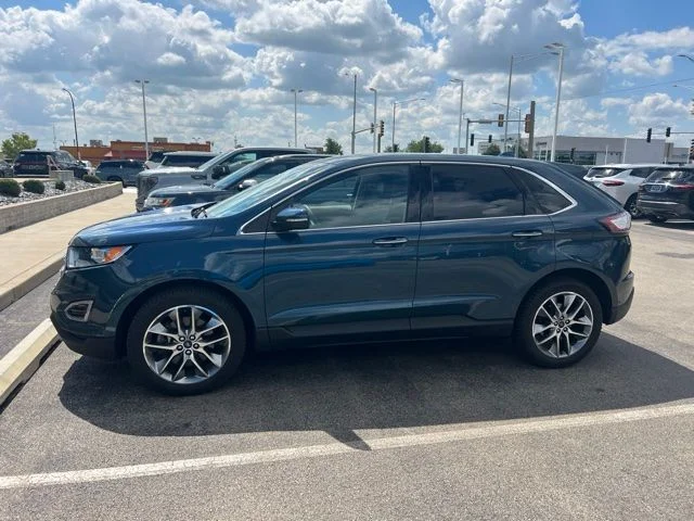 Used 2016 Blue Ford Titanium image 1
