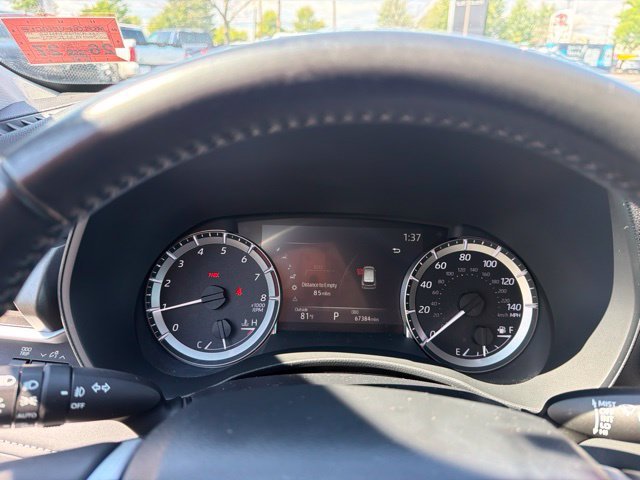 Used 2024 Celestial Silver Metallic Toyota LE image 16