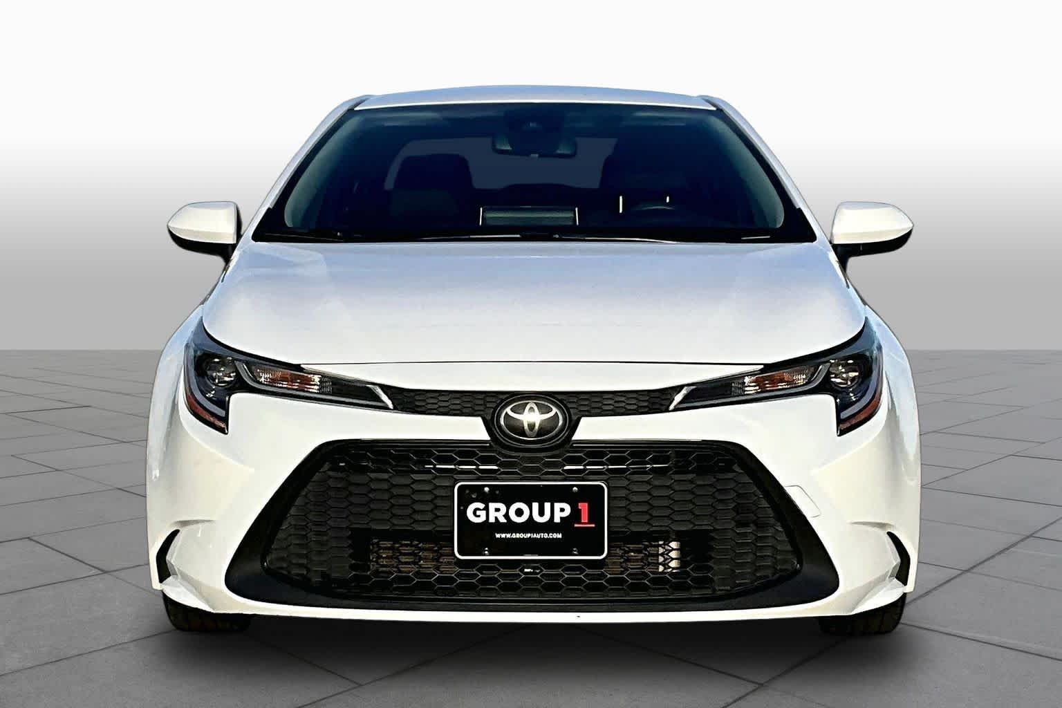 Used 2021 Super White Toyota LE image 4