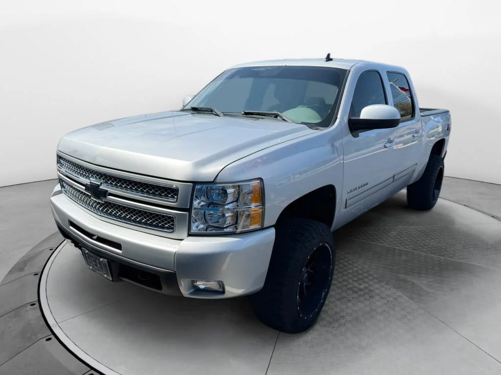 Used 2012 SILVER ICE METALLIC Chevrolet LTZ image 1