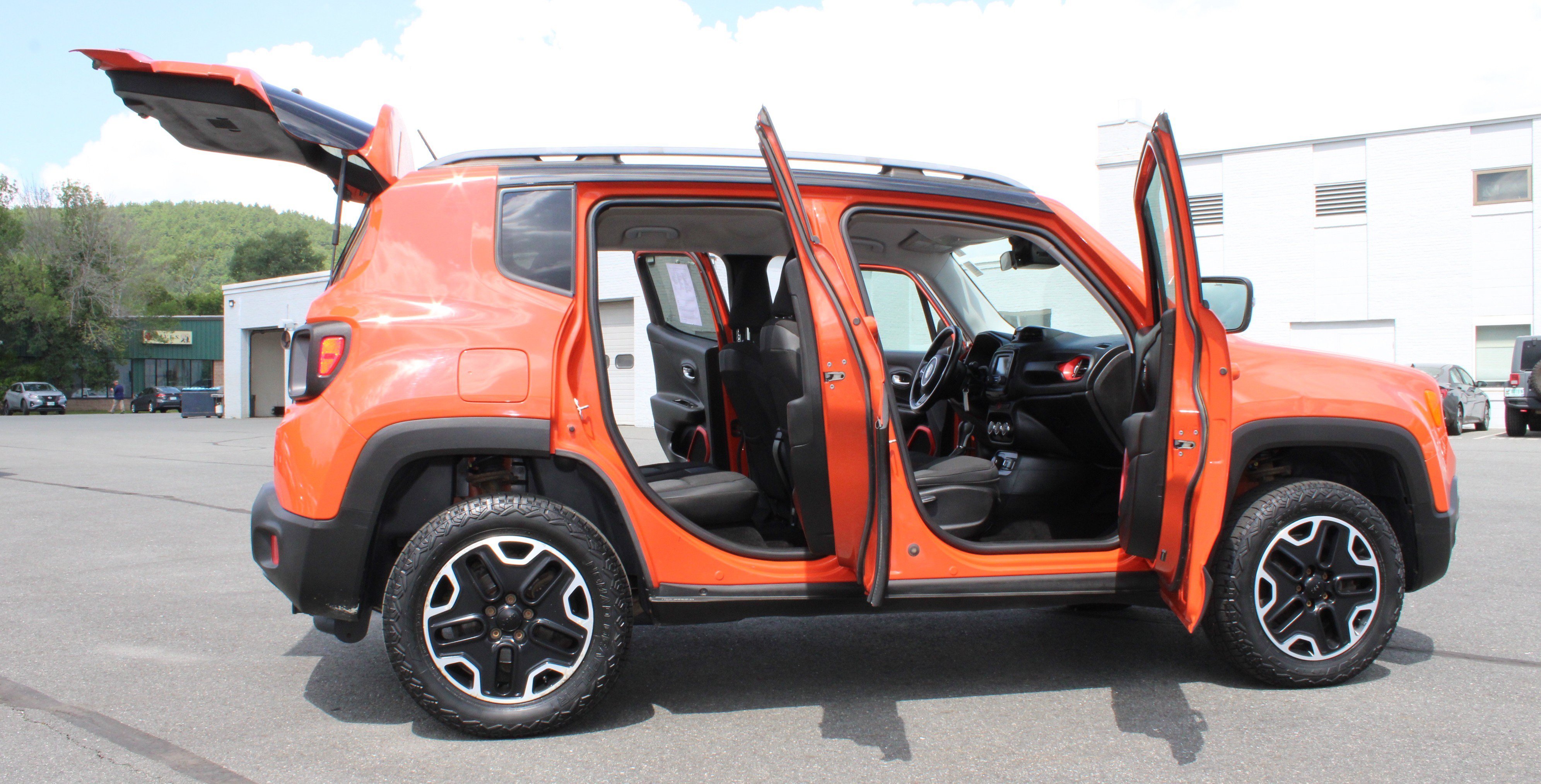 Used 2015 Omaha Orange Jeep Trailhawk image 9