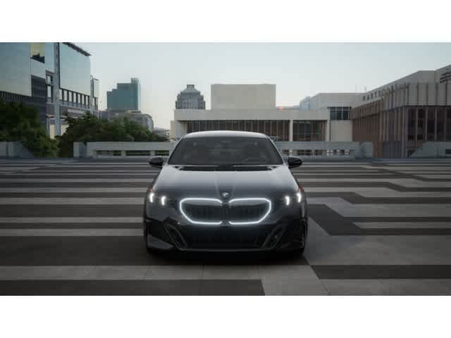 New 2027 Black Sapphire Metallic BMW 550e xDrive image 3