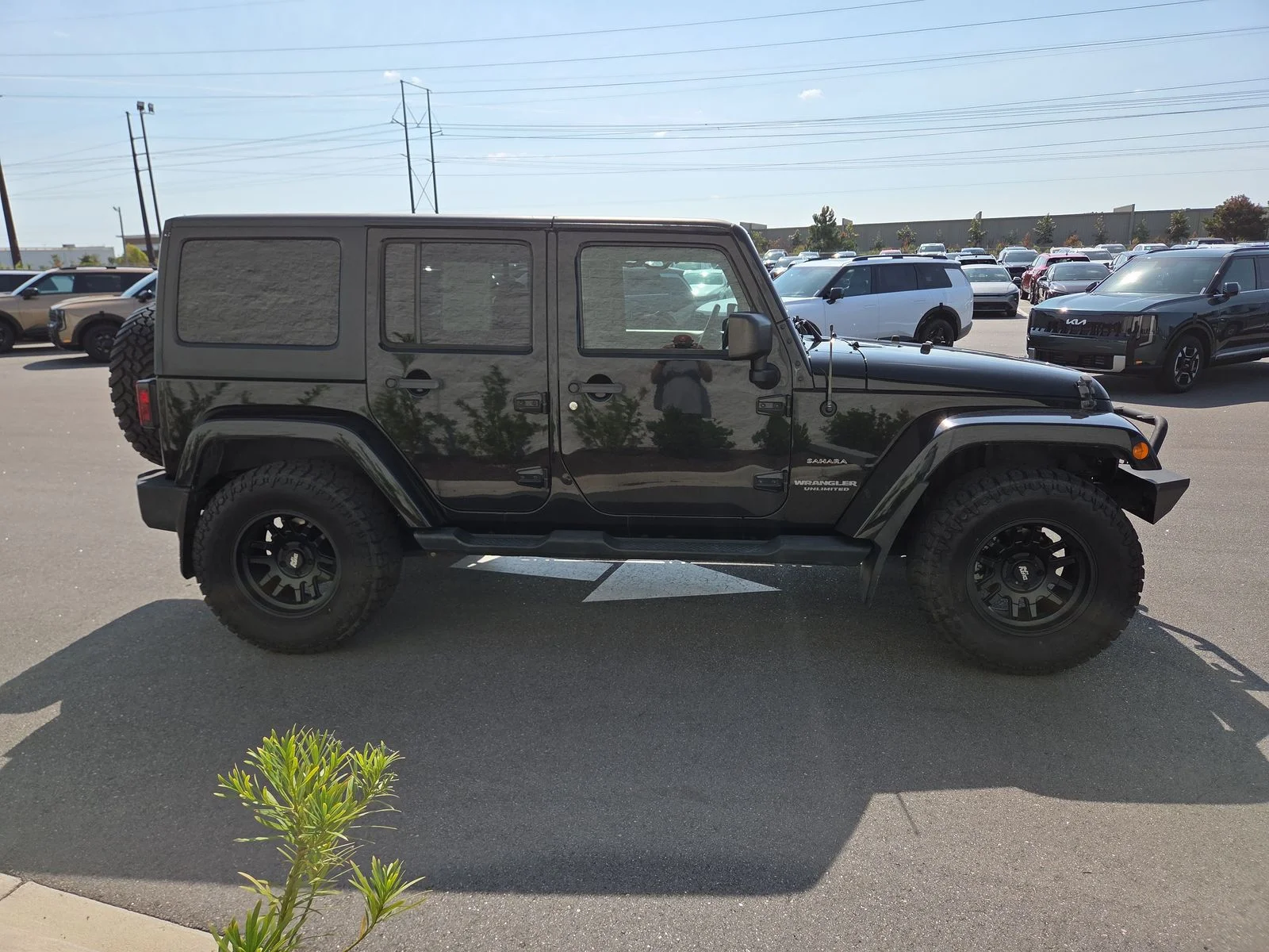 Used 2016 Black Clearcoat Jeep Unlimited Sahara image 7