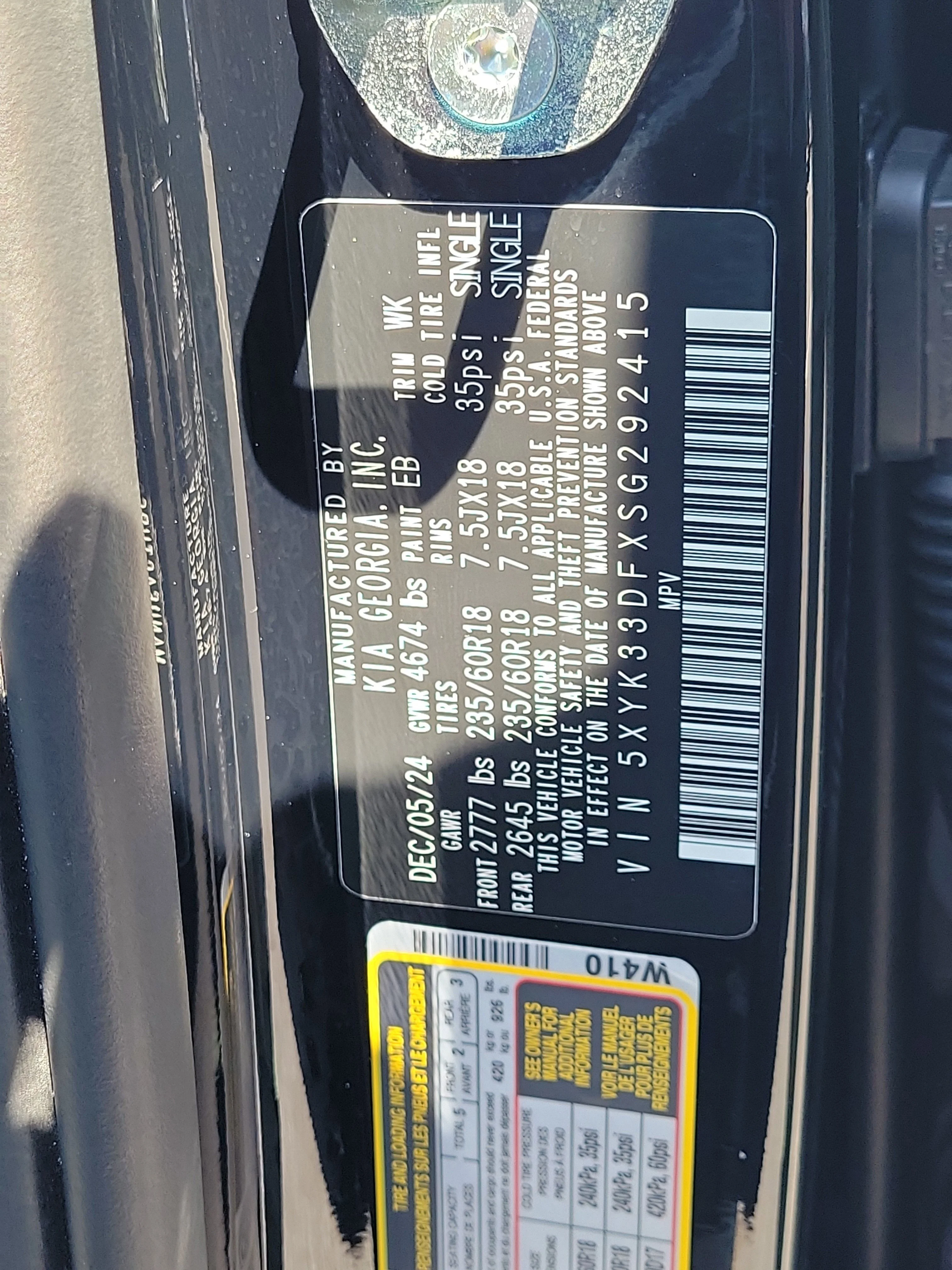 Used 2025 Ebony Black Kia EX image 33