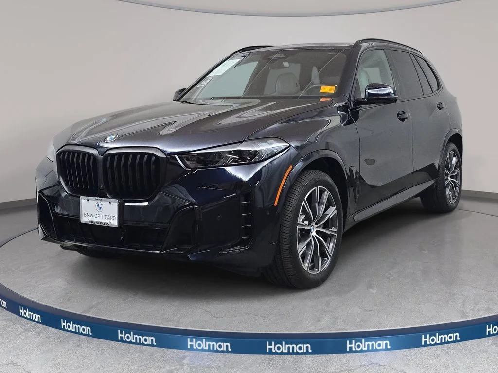 Used 2025 Carbon Black Metallic BMW xDrive40i image 1
