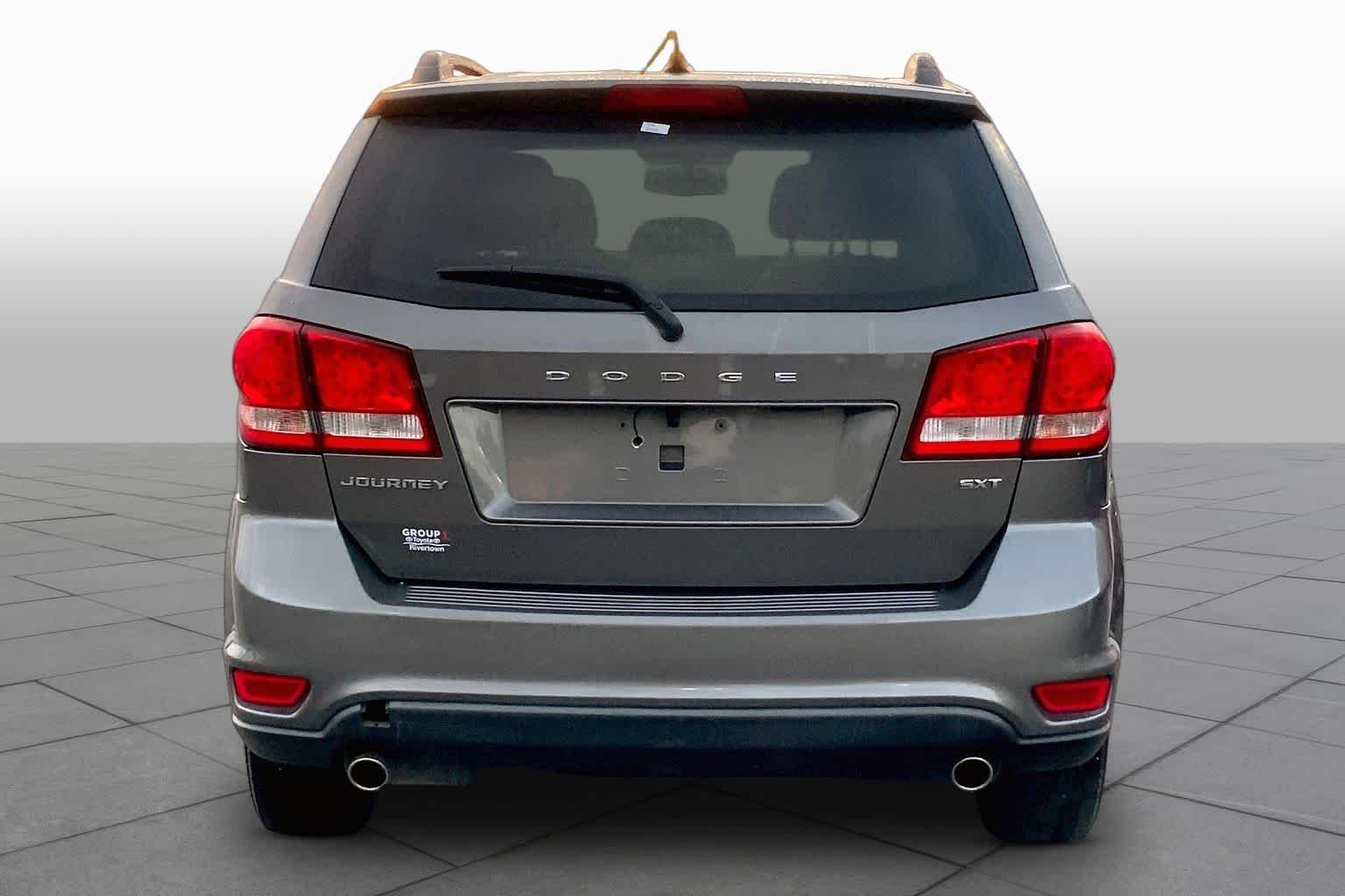 Used 2013 Storm Grey Pearl Dodge SXT image 4