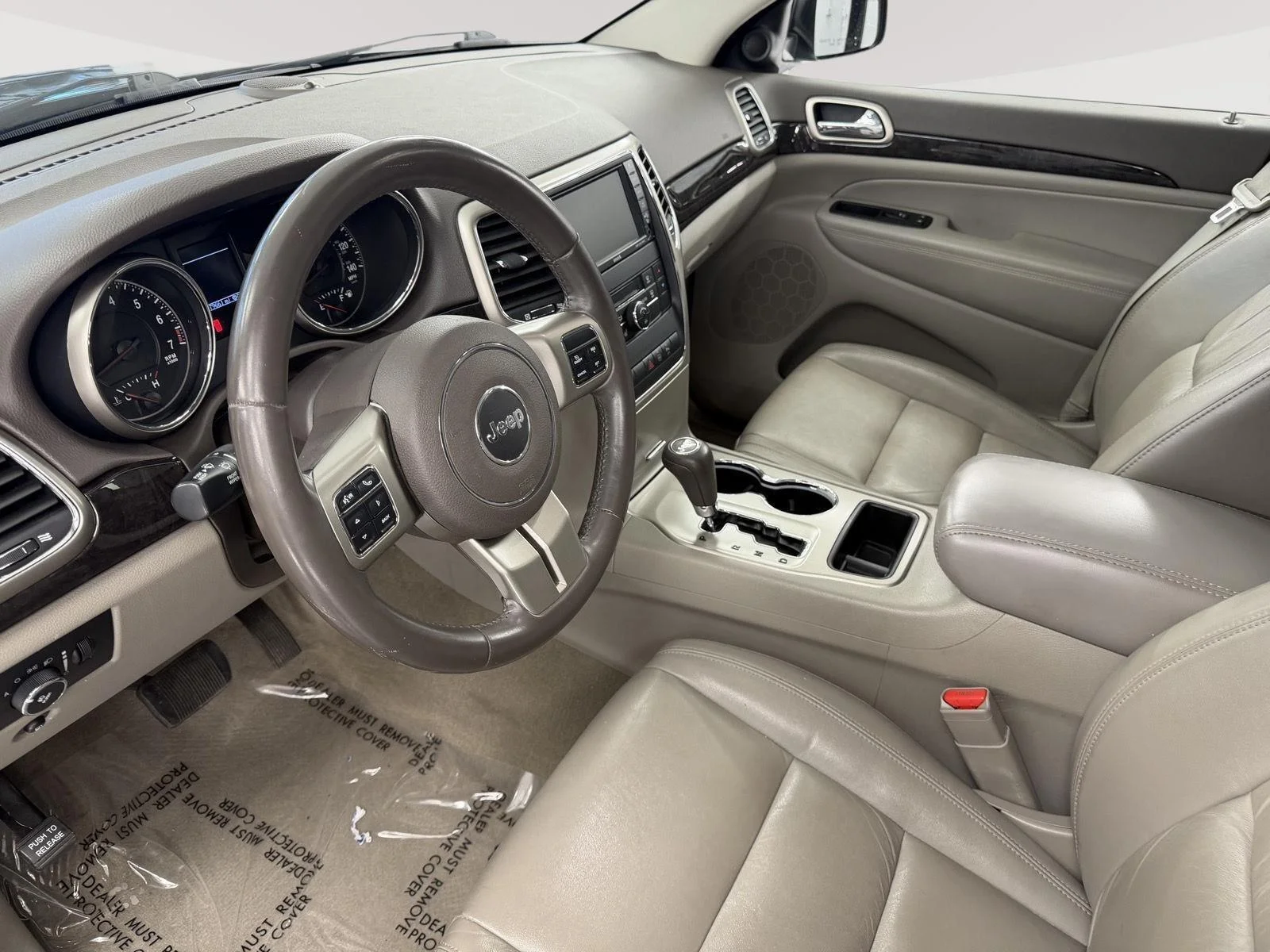 Used 2011 Dark Charcoal Pearl Jeep Laredo image 21