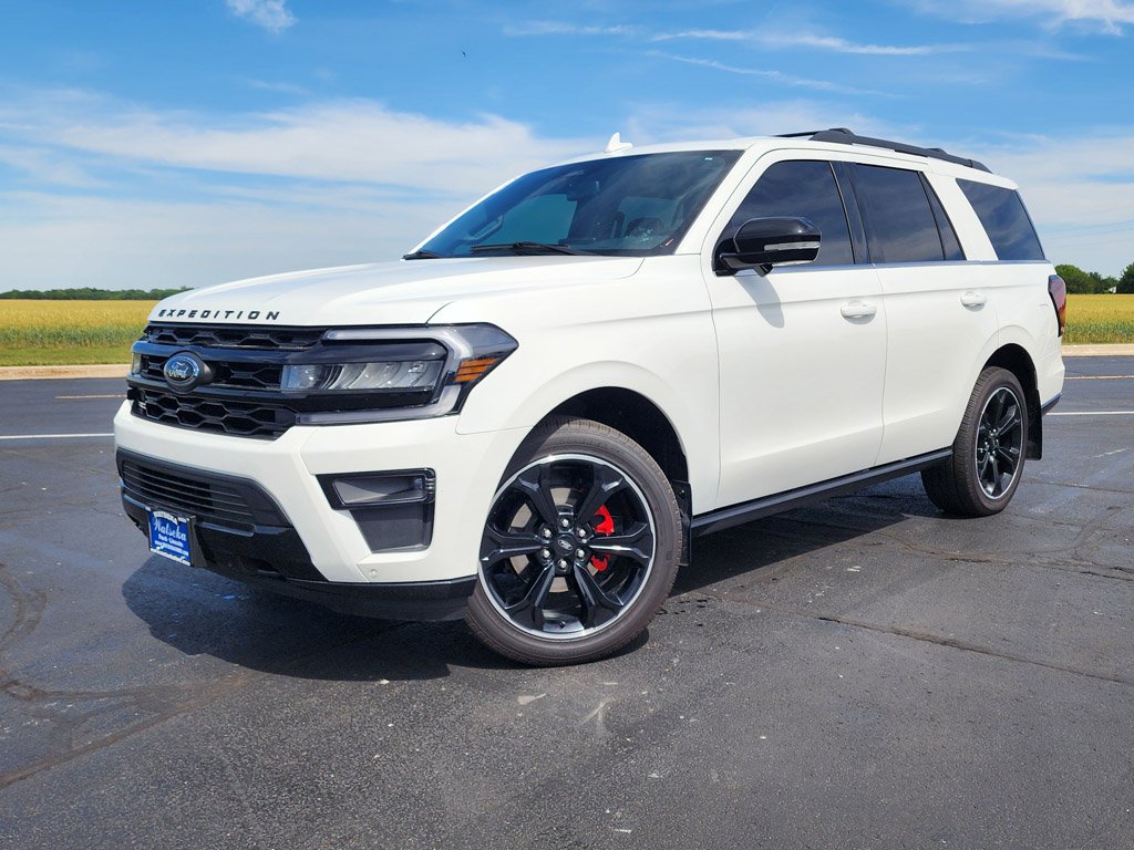 Used 2024 Star White Metallic Tri-Coat Ford Limited image 1