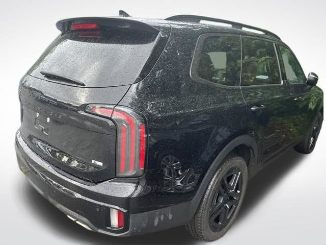 Used 2025 Ebony Black Kia EX X-Line image 4