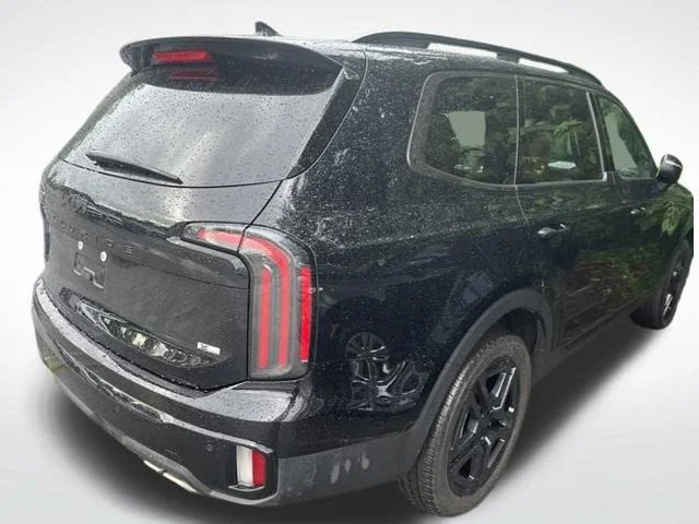 Used 2025 Black Kia EX X-Line image 4