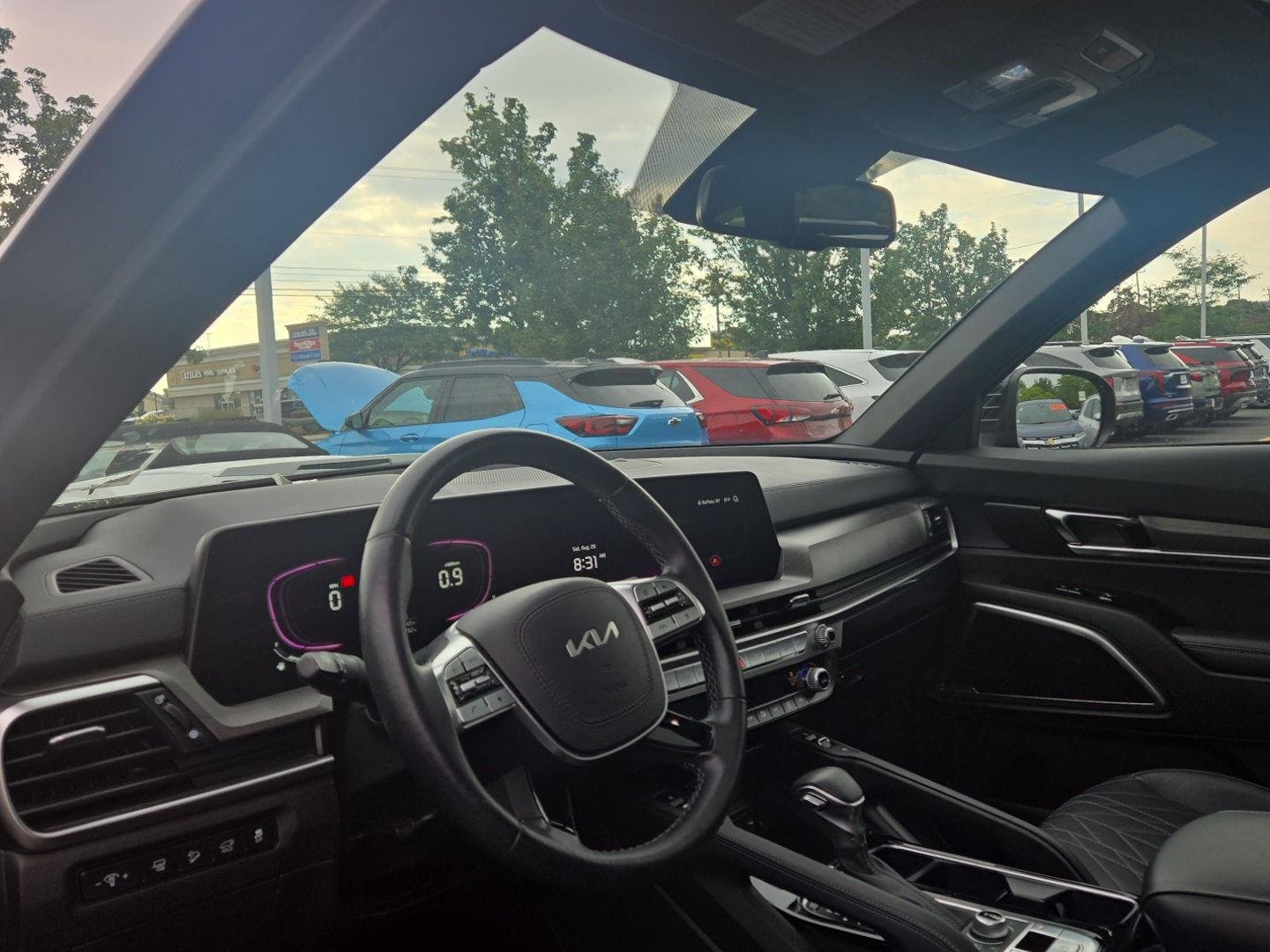 Used 2024 Ebony Black Kia EX X-Line image 3