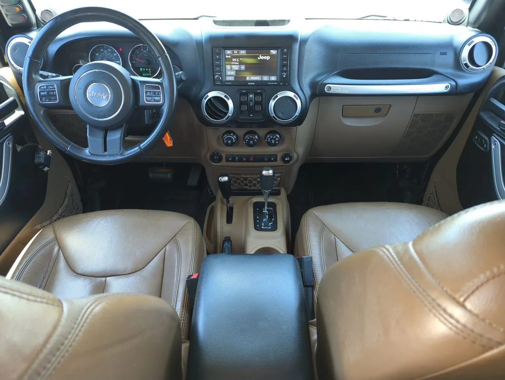 Used 2014 Black Jeep Unlimited Sahara image 15
