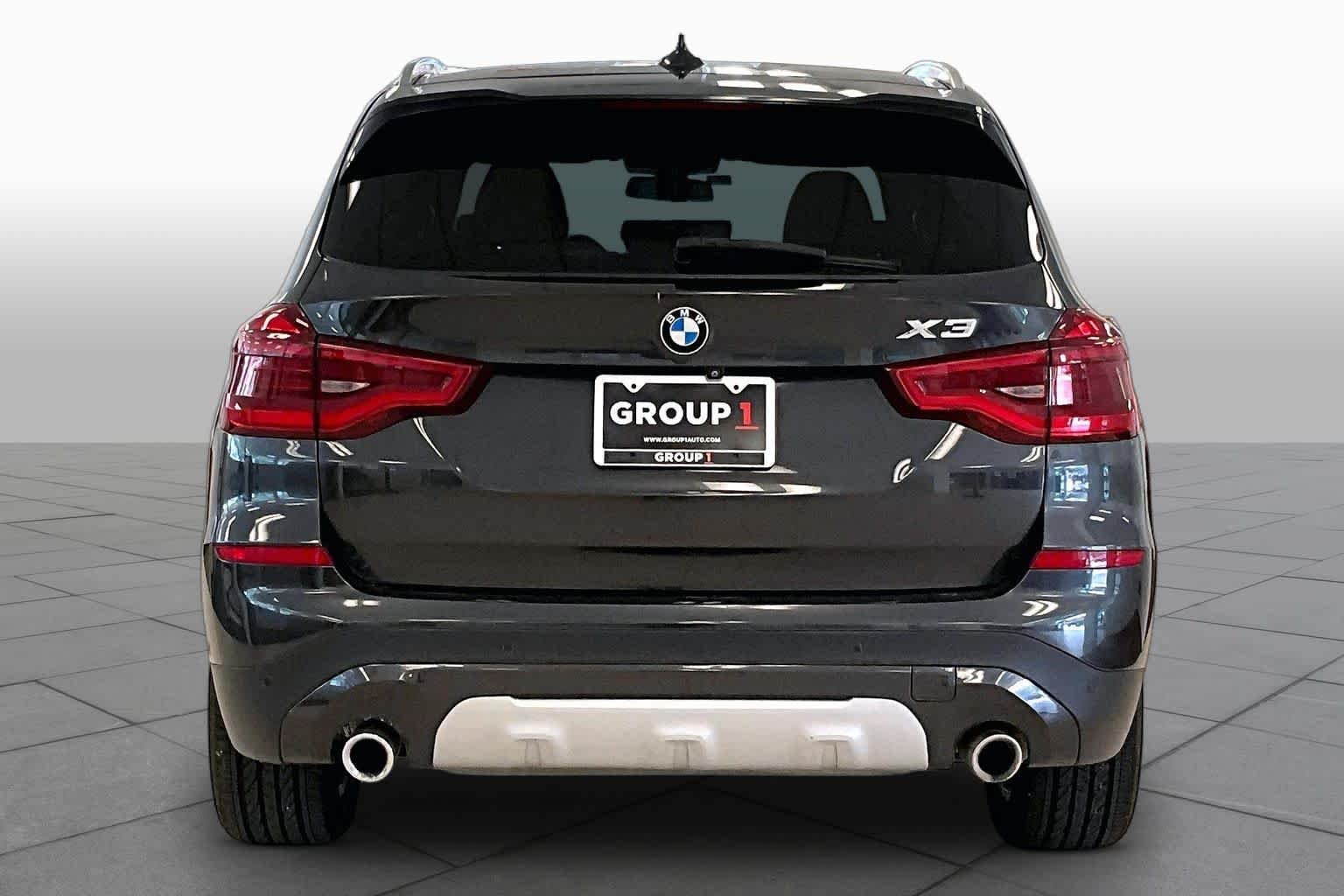 Used 2018 Dark Graphite Metallic BMW xDrive30i image 4