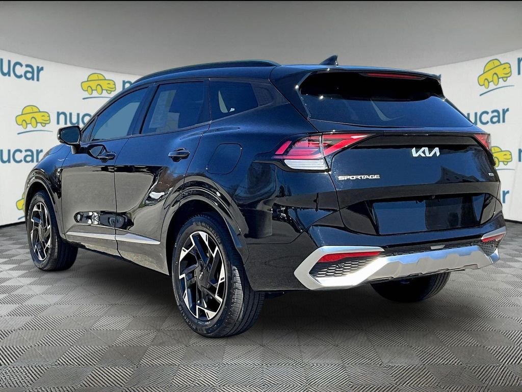 Used 2023 Ebony Black Kia SX-Prestige image 4