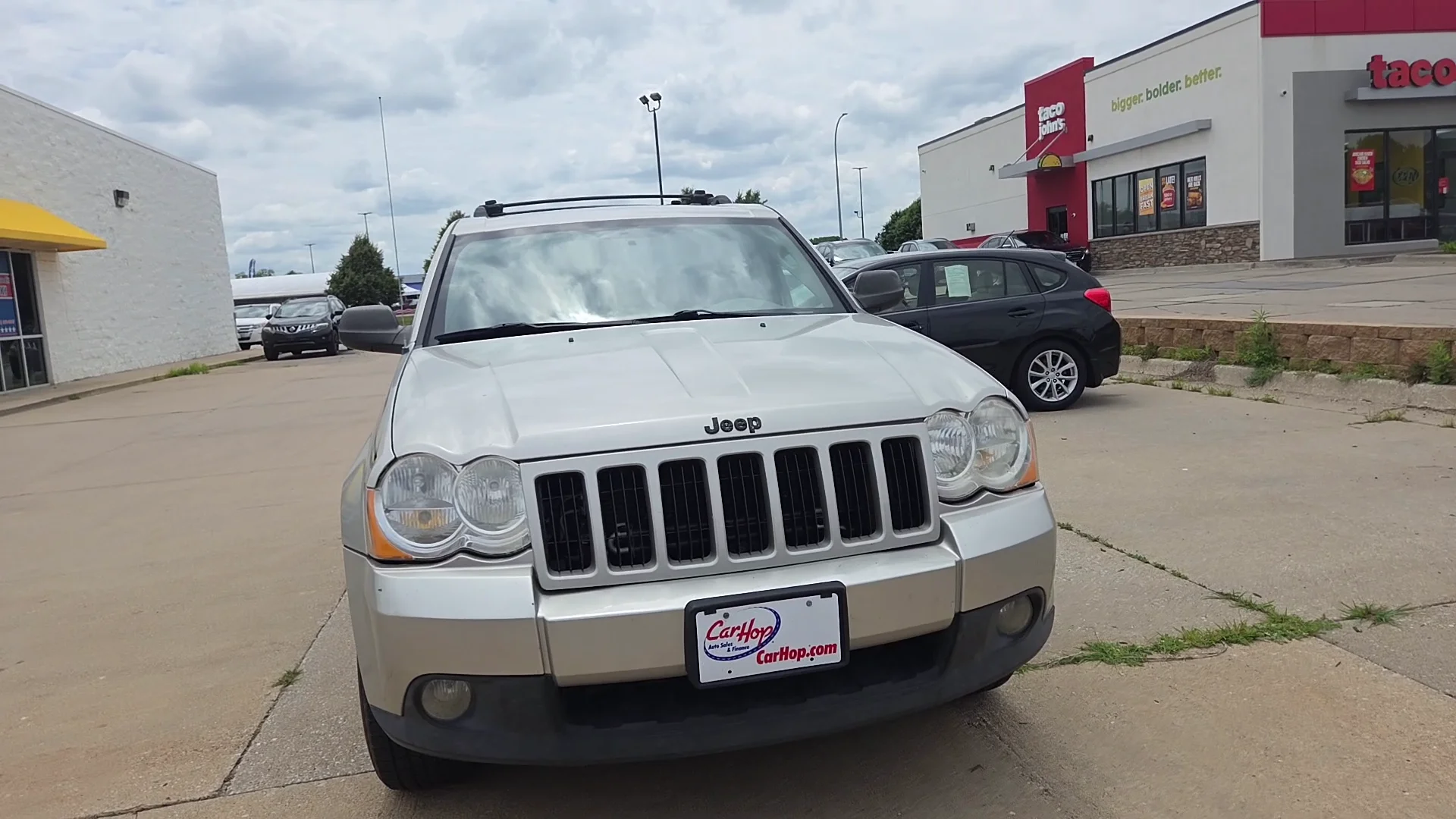 Used 2010 Silver Jeep LAREDO image 2