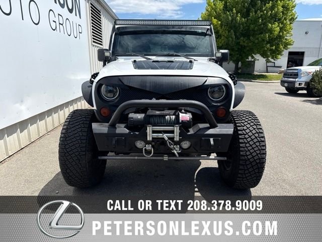 Used 2013 White Jeep Unlimited Sport image 9