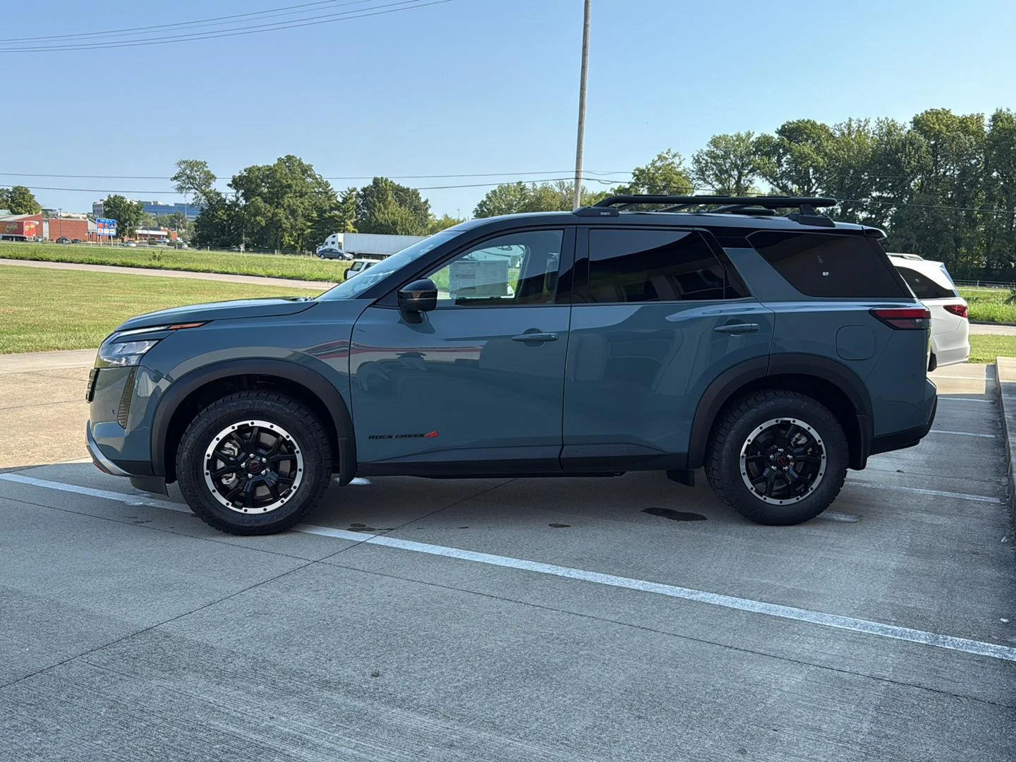 New 2026 Baltic Teal/Super Black Metallic Nissan Rock Creek image 4