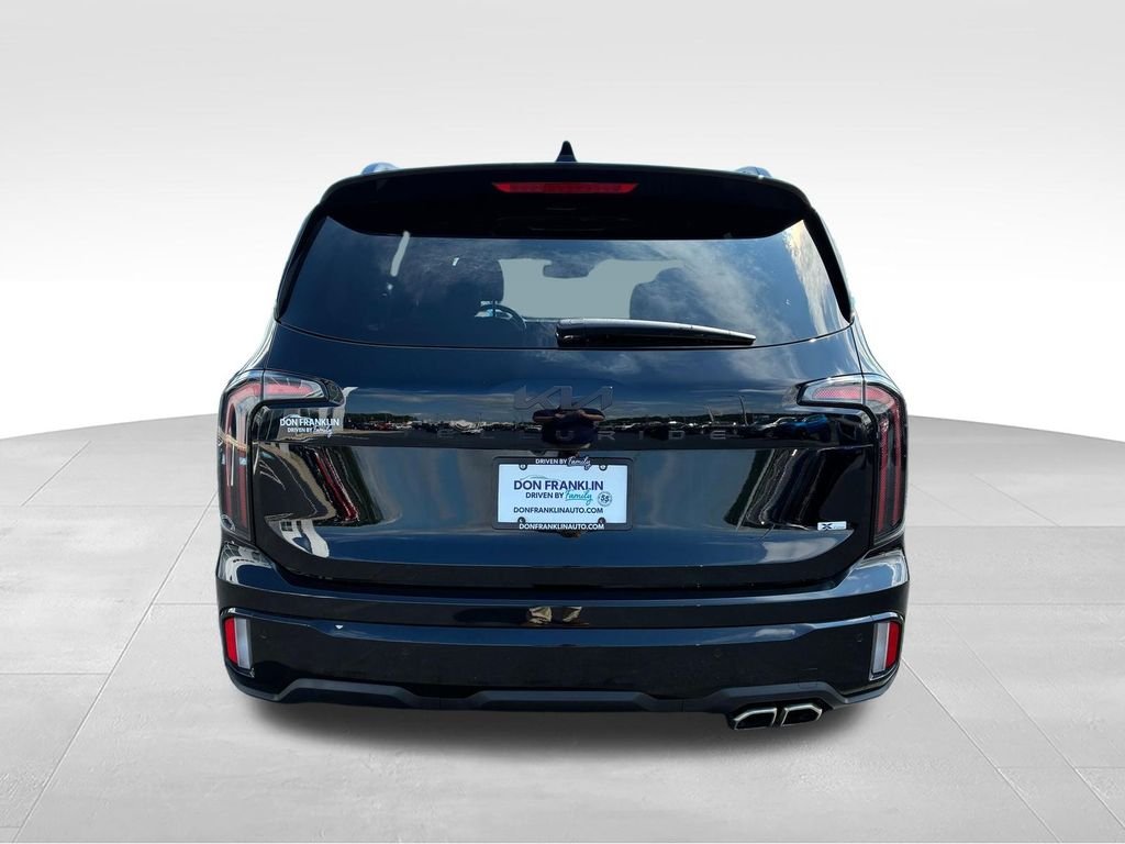 Certified Used 2025 Black Kia EX X-Line image 3