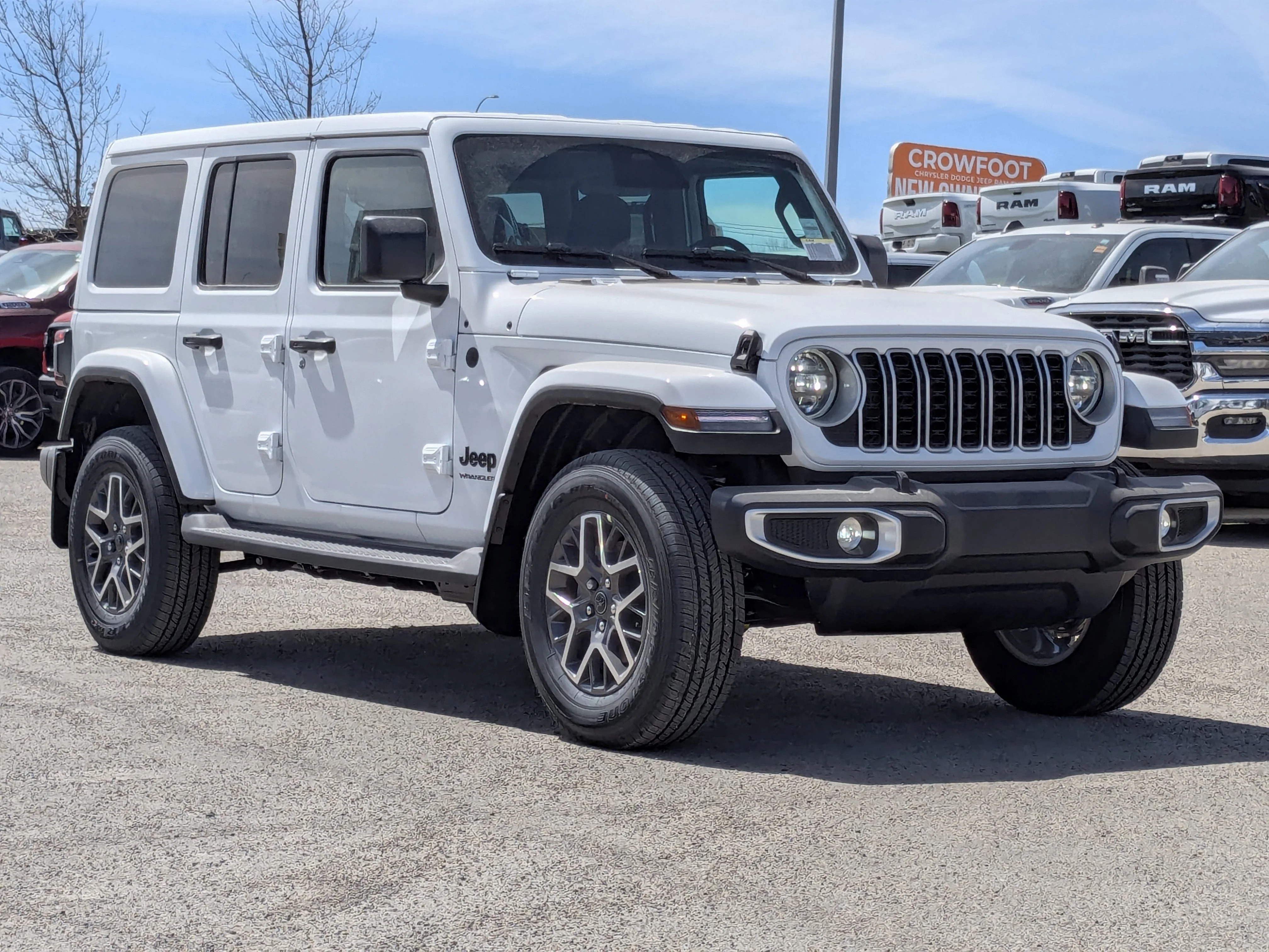 New 2026 White Jeep Sahara - - Body-Color Top - Side Steps - 2.0L Turbo - Remote Start & tons more! image 2