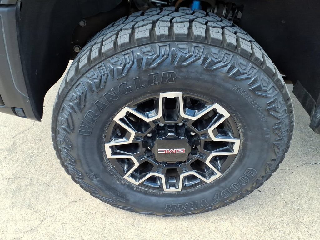 Used 2024 Volcanic Red Tintcoat GMC AT4X image 9