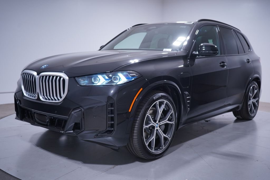 New 2026 Black Sapphire Metallic BMW xDrive50e image 1